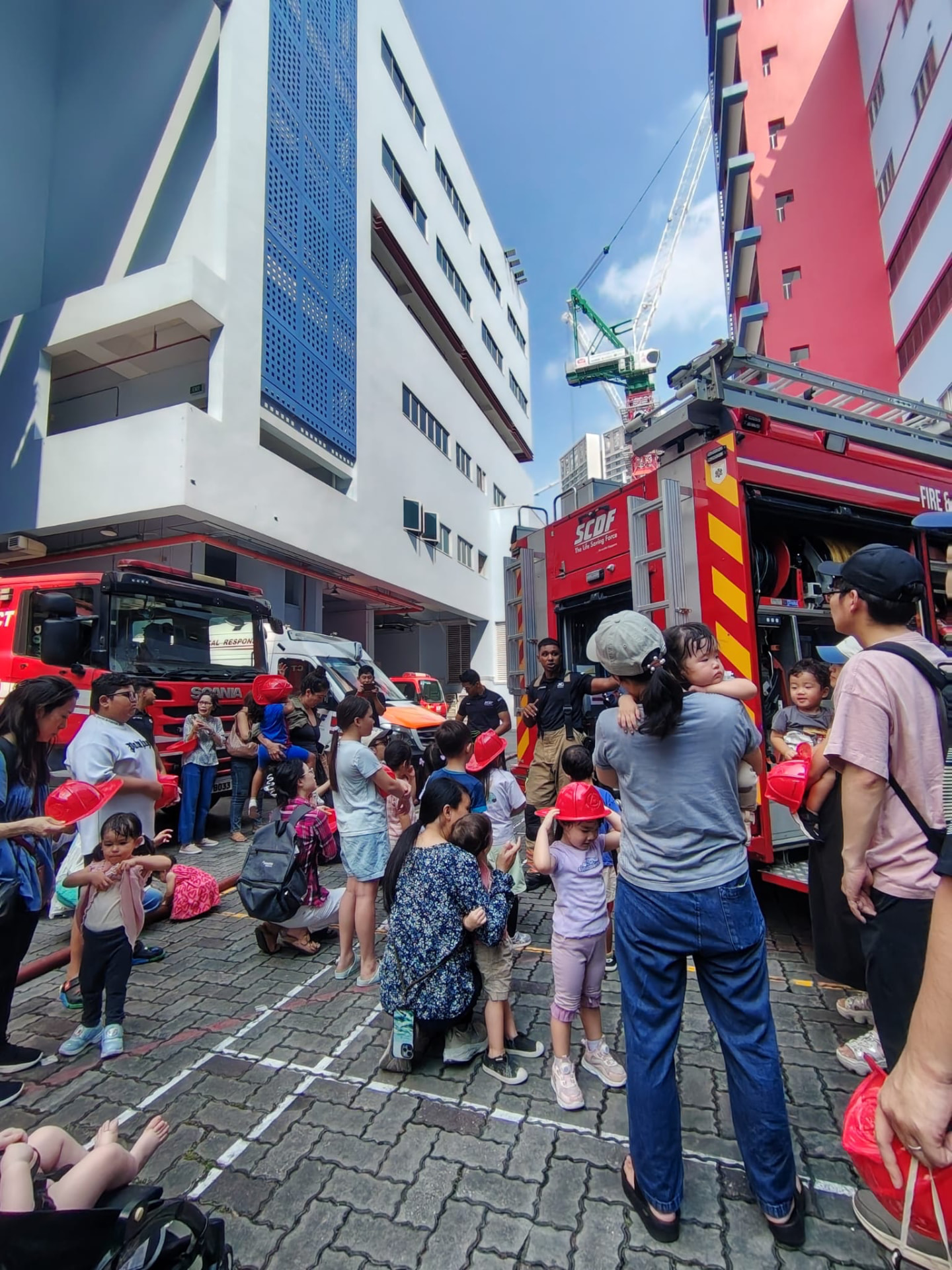 Children and families visiting a fire station